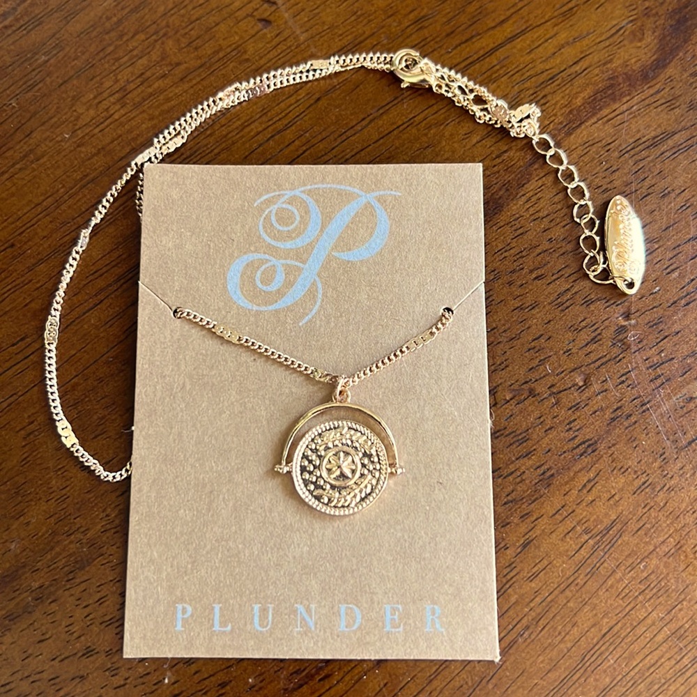 Gold coin necklace with floral stamp